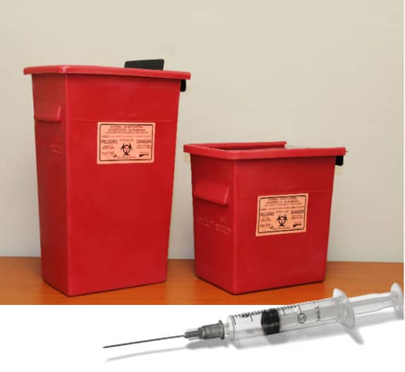 red waste container with syringe